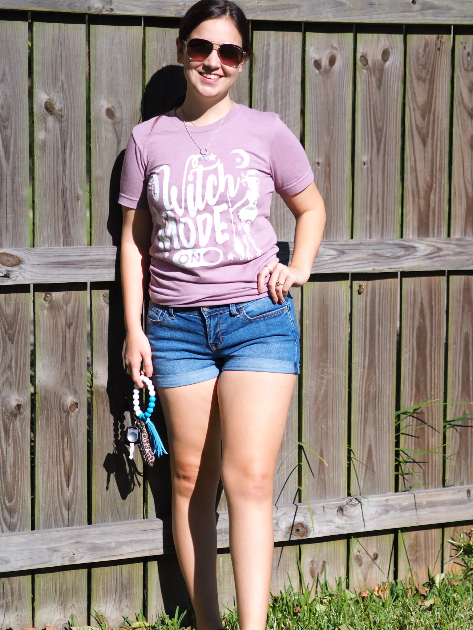 Emily Posing by Fence