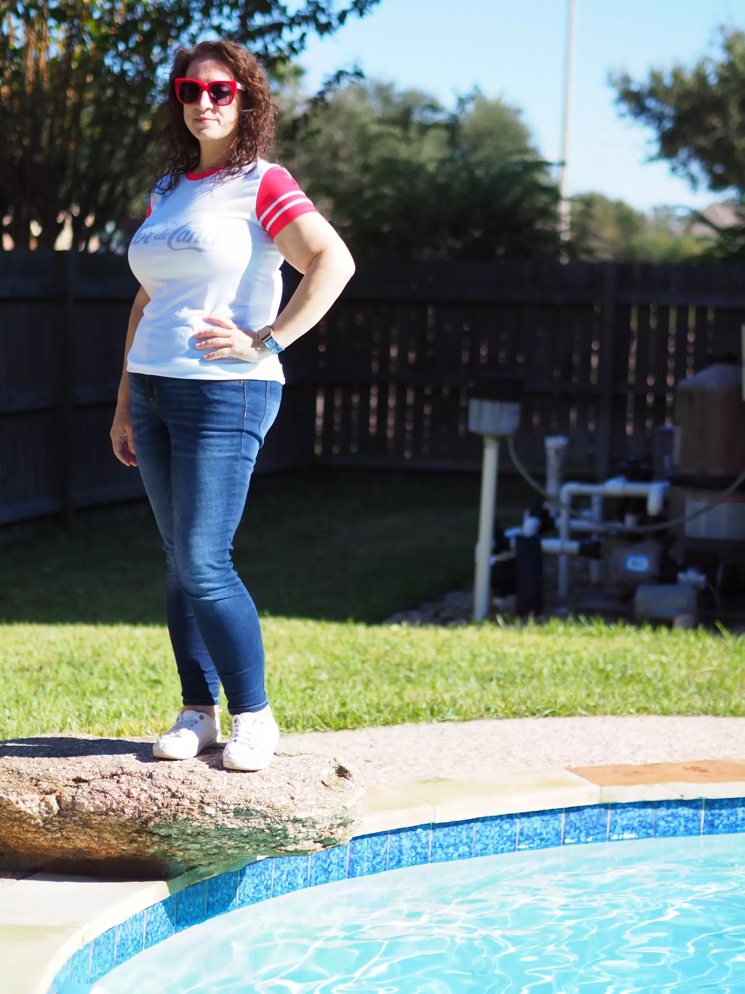 Dominica in Jeans Modeling by Swimming Pool