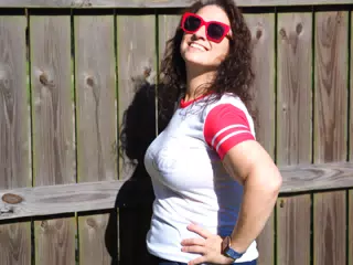 Dominica Posing by Fence