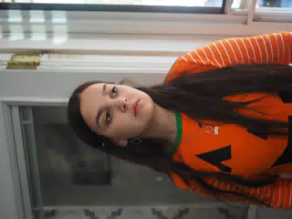 Emily in Pumpkin Pajamas with Natural Light