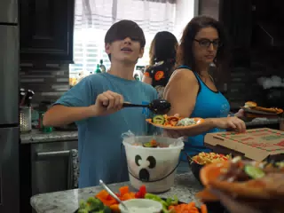 Garrett Dishing Dinner