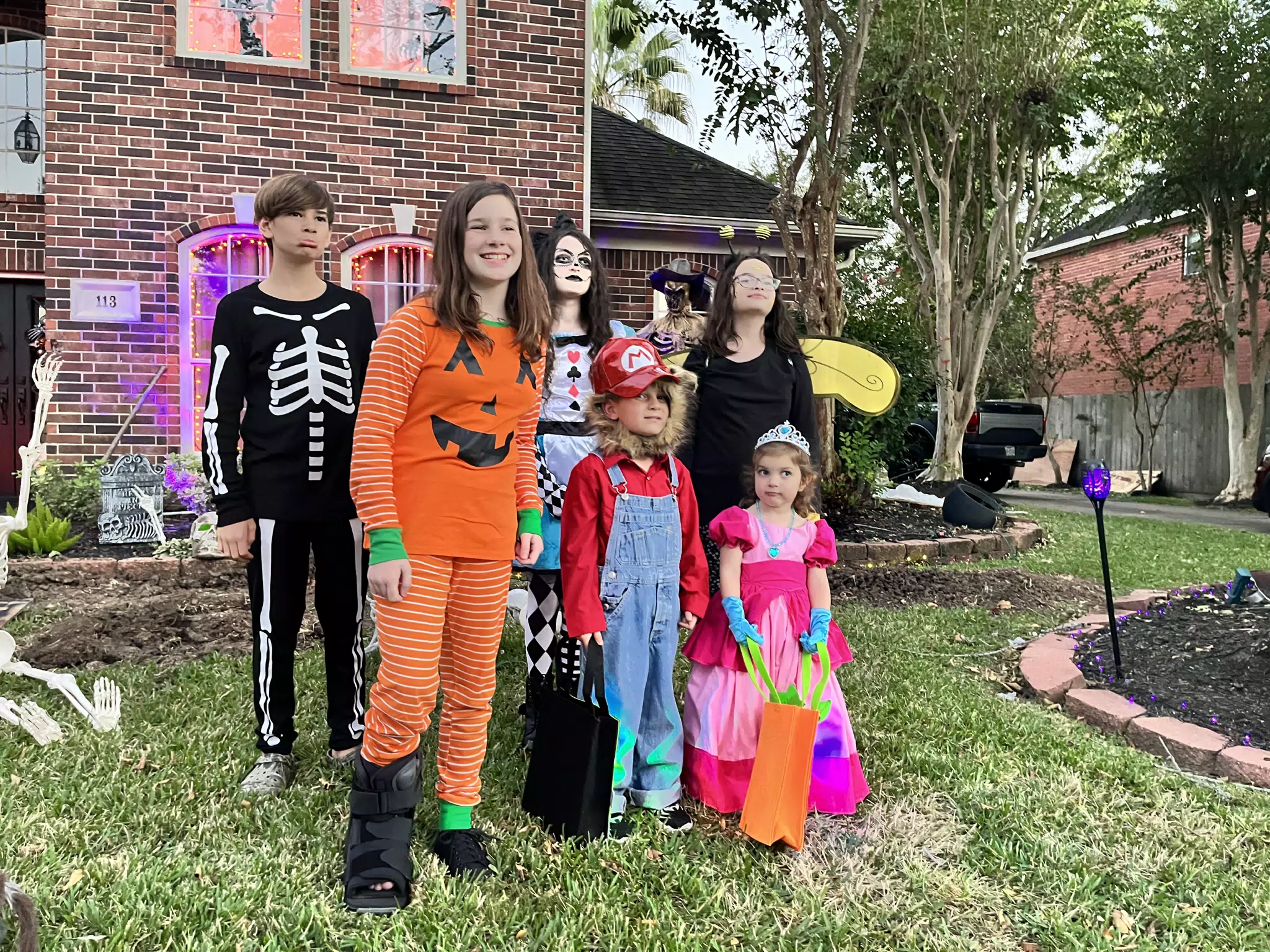 All of the Cousins Posing for Halloween Pictures