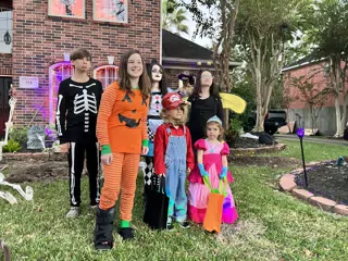 All of the Cousins Posing for Halloween Pictures