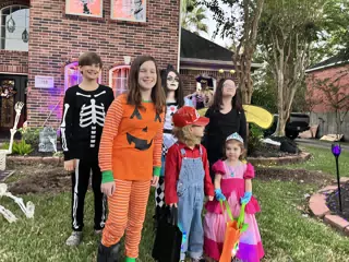 Cousins Posing in their Halloween Costumes