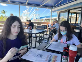 Liesl & Luciana Ordering Dinner at Wahoo's
