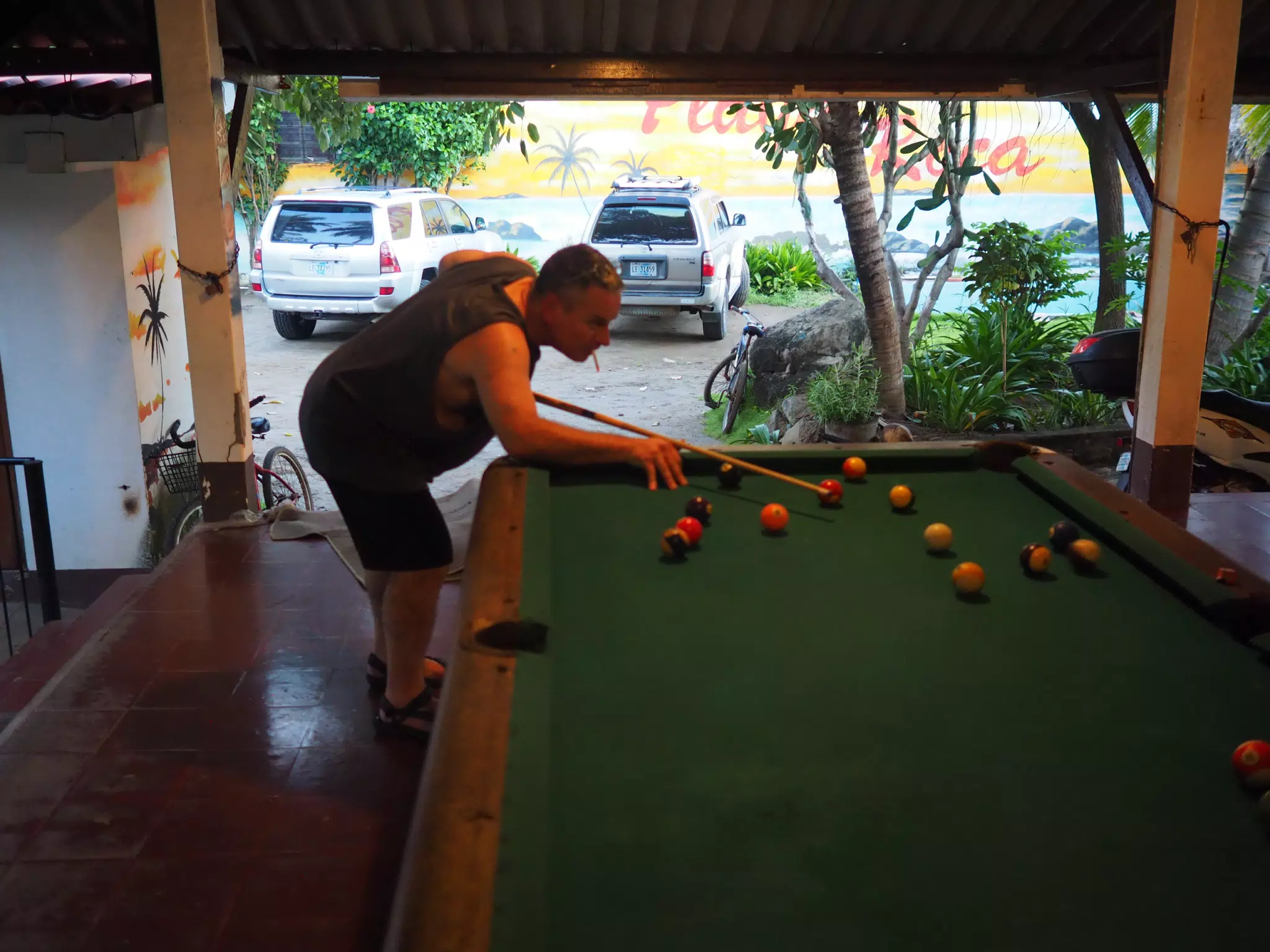 Paul Shooting Pool at Playa Roca