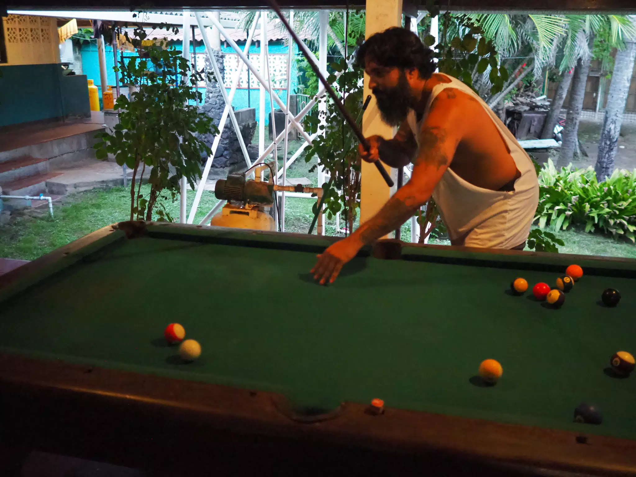 Saeed Shooting Pool at Playa Roca