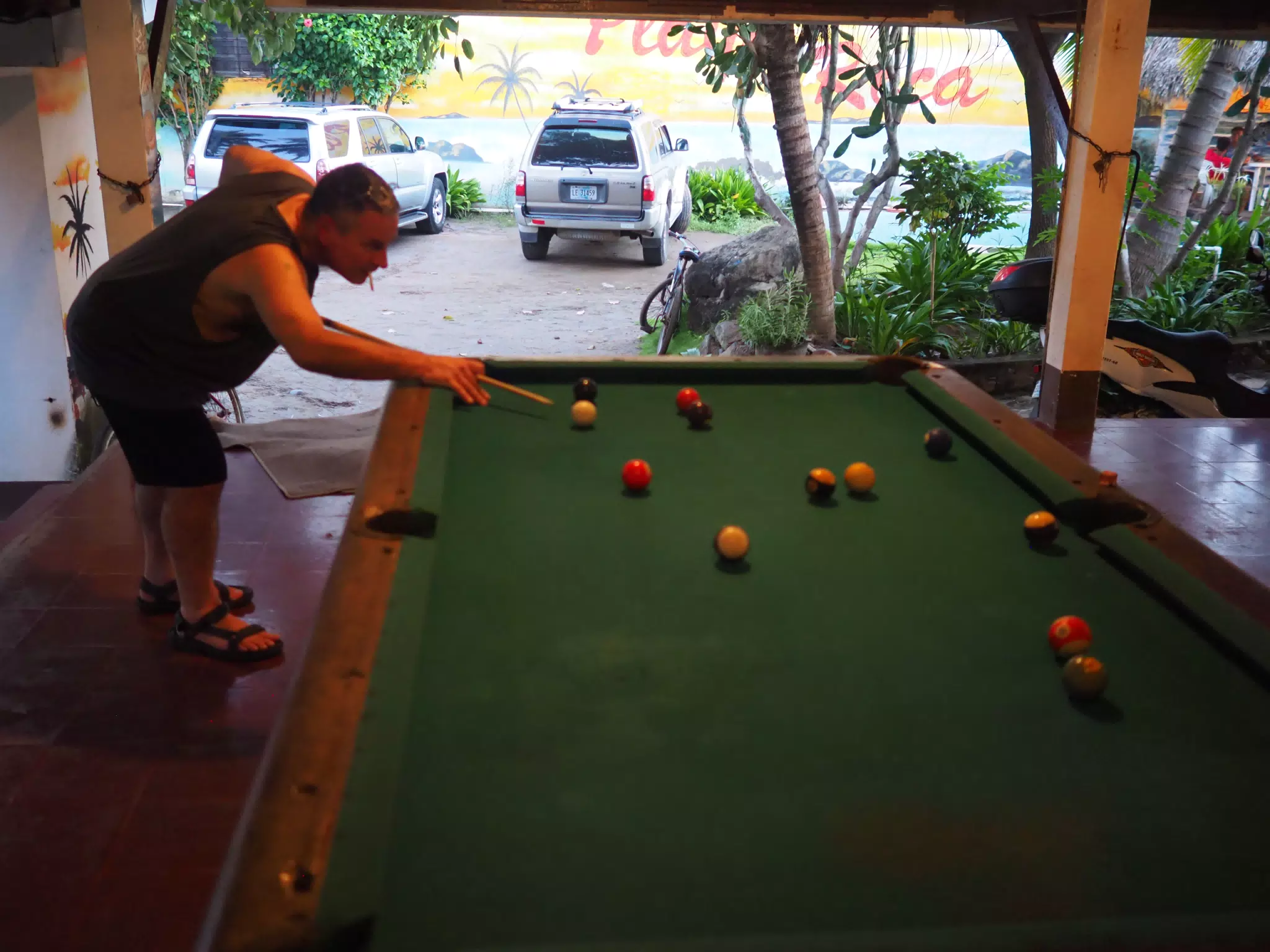 Paul Shooting Pool at Playa Roca