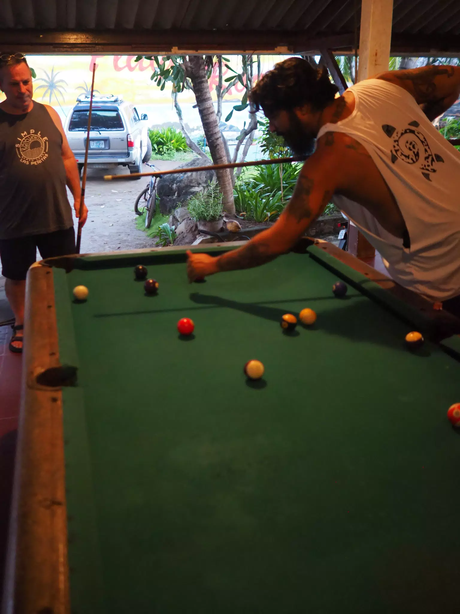 Saeed Shooting Pool at Playa Roca