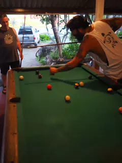 Saeed Shooting Pool at Playa Roca