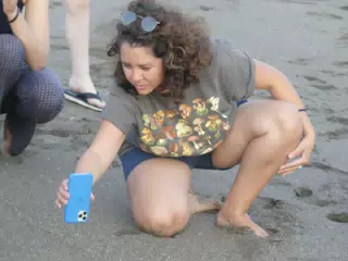 Ivonne Taking Beach Pictures