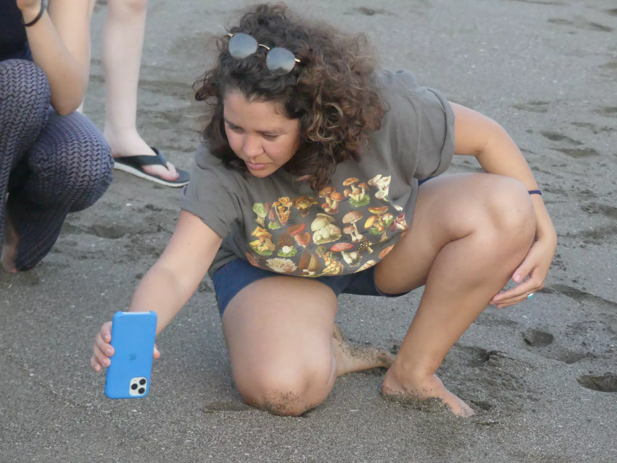 Ivonne Filming with iPhone on Beach