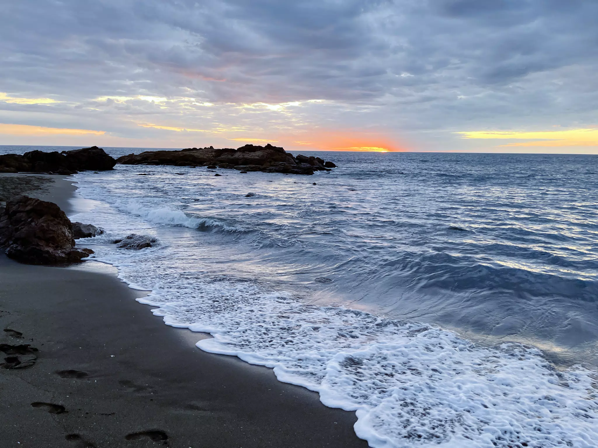 Sunset Over the Rocks on Las Penitas Beach
