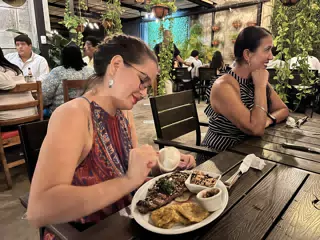 Ivonne with New York Strip Steak at El Carbon at Jalisco in Leon, Nicaragua