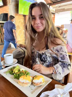 Camille with Eggs Benedict at Ikal in San Juan del Sur, Nicaragua