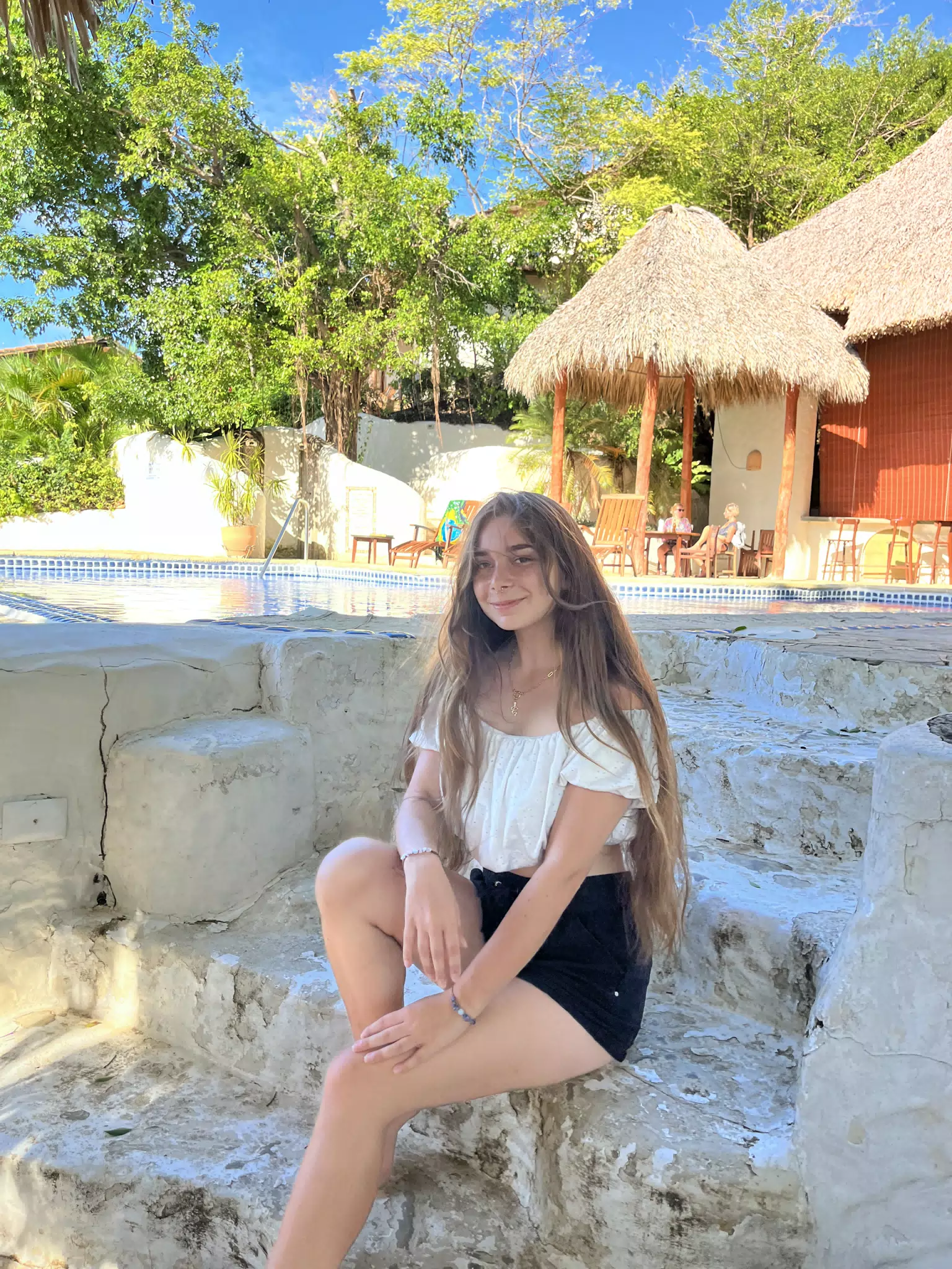 Camille Modeling by Pool in Shorts at La Cascada at Pelican Eyes in San Juan del Sur, Nicaragua