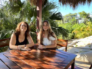 Dominica and Camille Waiting on Lunch