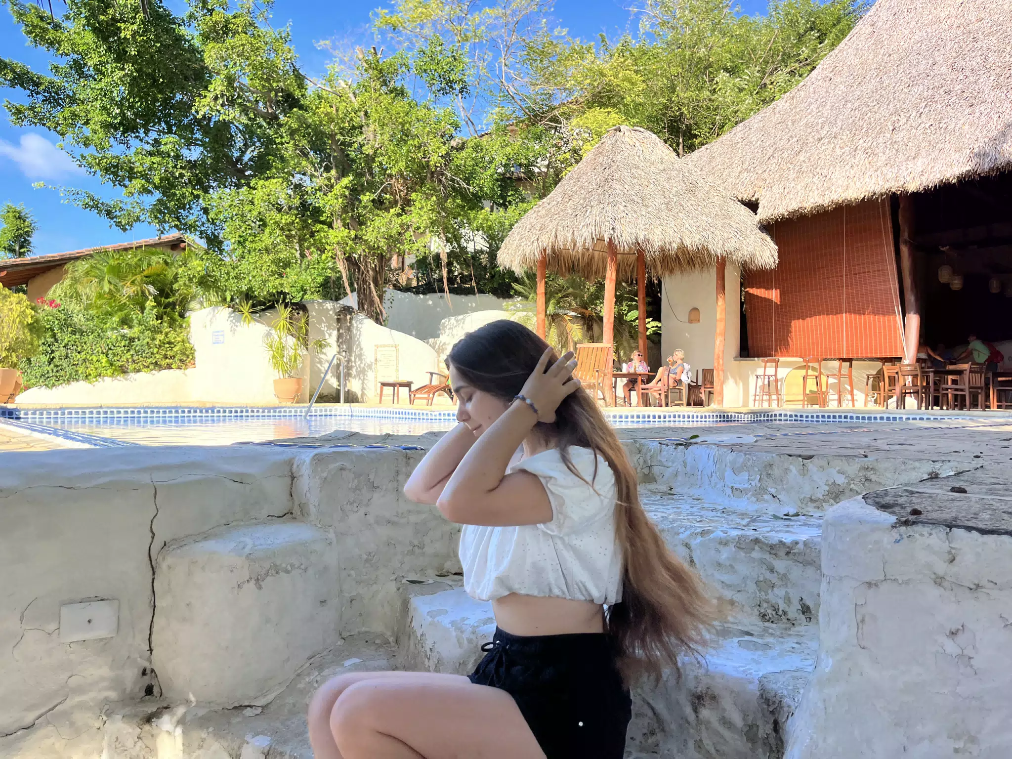 Adjusting Her Hair