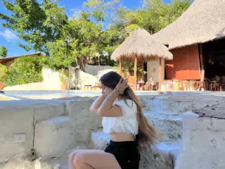 Adjusting Her Hair