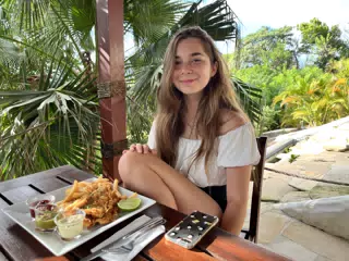 Cami with Fish and Chips at La Cascada at Pelican Eyes in San Juan del Sur Nicaragua