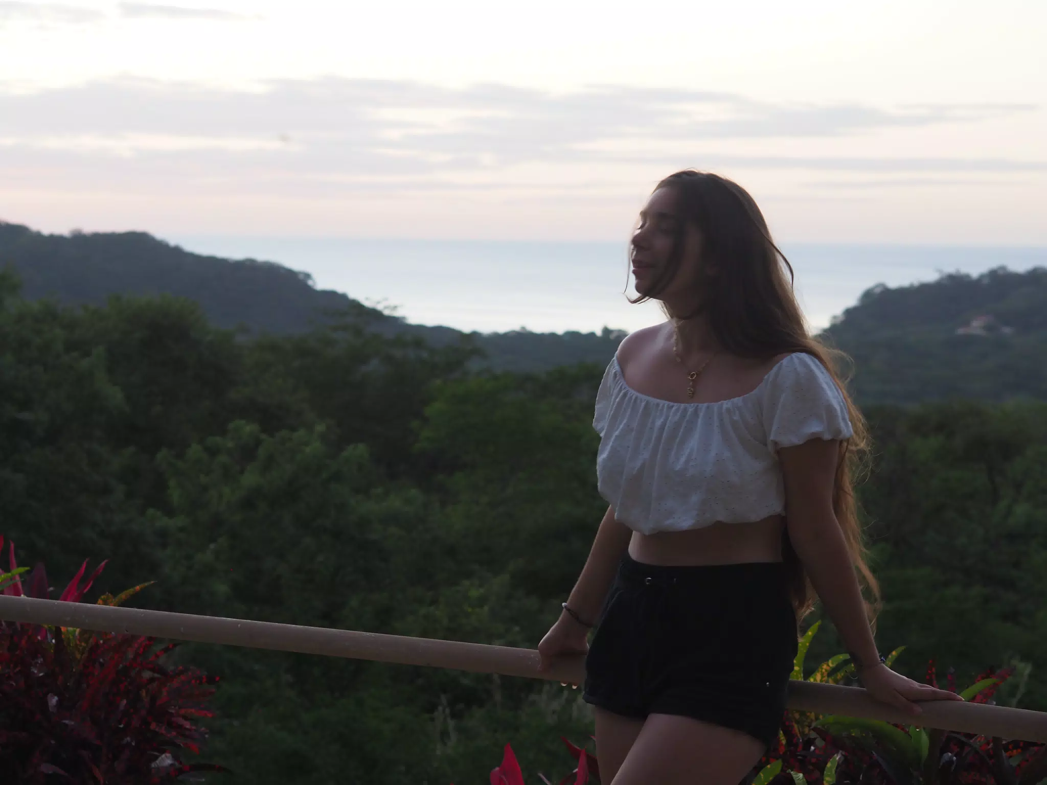 Camille Leaning on Railing