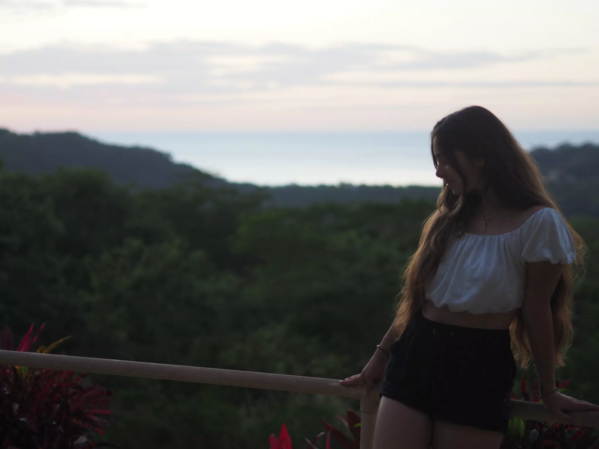 Teen Girl on Railing in San Juan del Sur