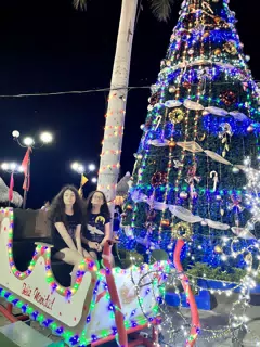 Liesl and Luciana by Christmas Tree at Salvador Allende Park, Managua, Nicaragua