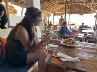 Camille with Nachos at the Simple Beach Lodge