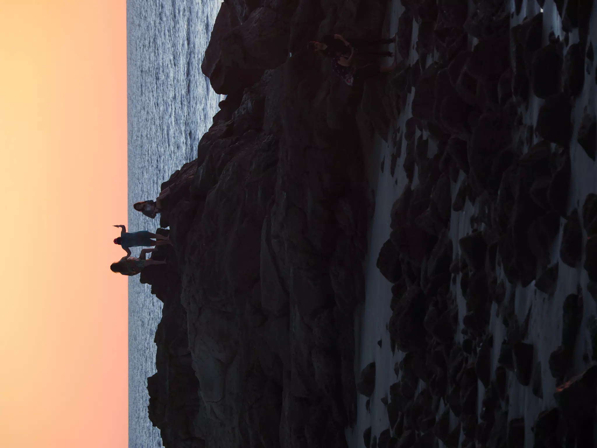 People Climbing on the Rocks in Las Peñitas