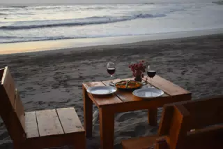 Wine and Paella at the Simple Beach Lodge in Poneloya