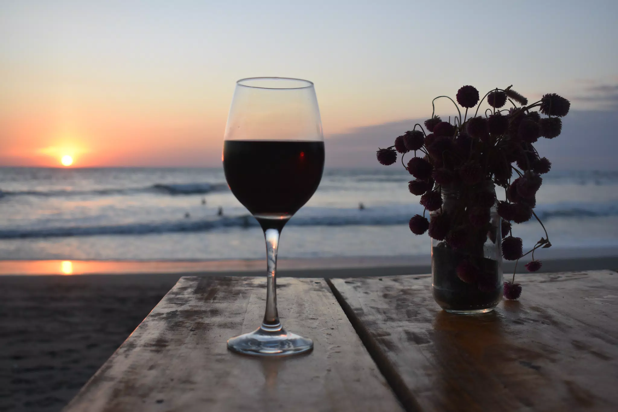 Red Wine on the Beach at Sunset at the Simple Beach Lodge in Las Peñitas Nicaragua