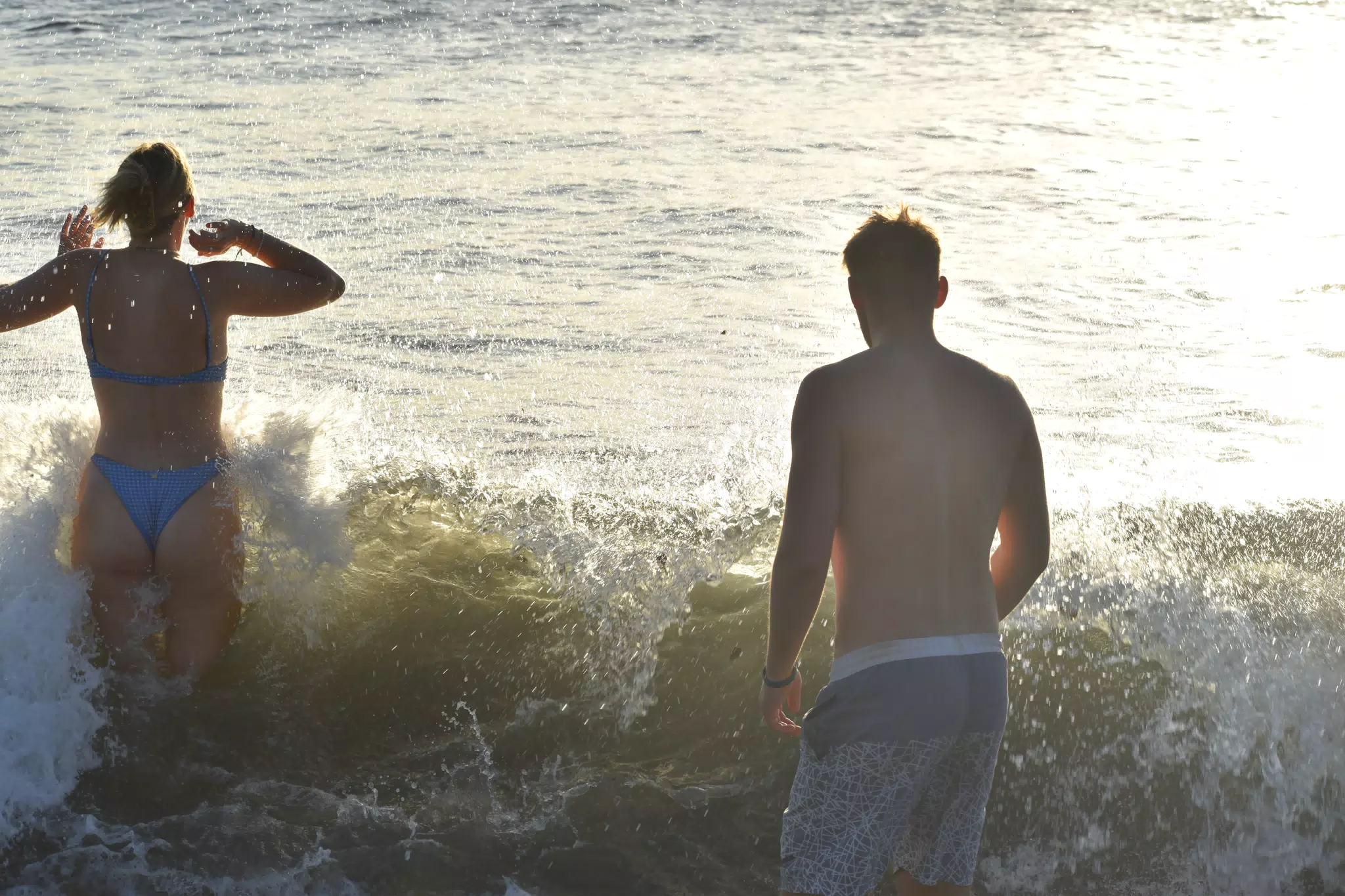 People Playing in the Pacific Ocean