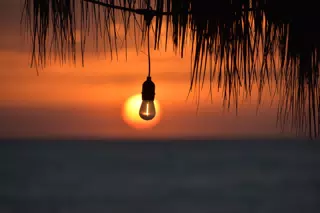 Sunset with Lightbulb at El Simple Beach Lodge, Las Peñitas, Nicaragua