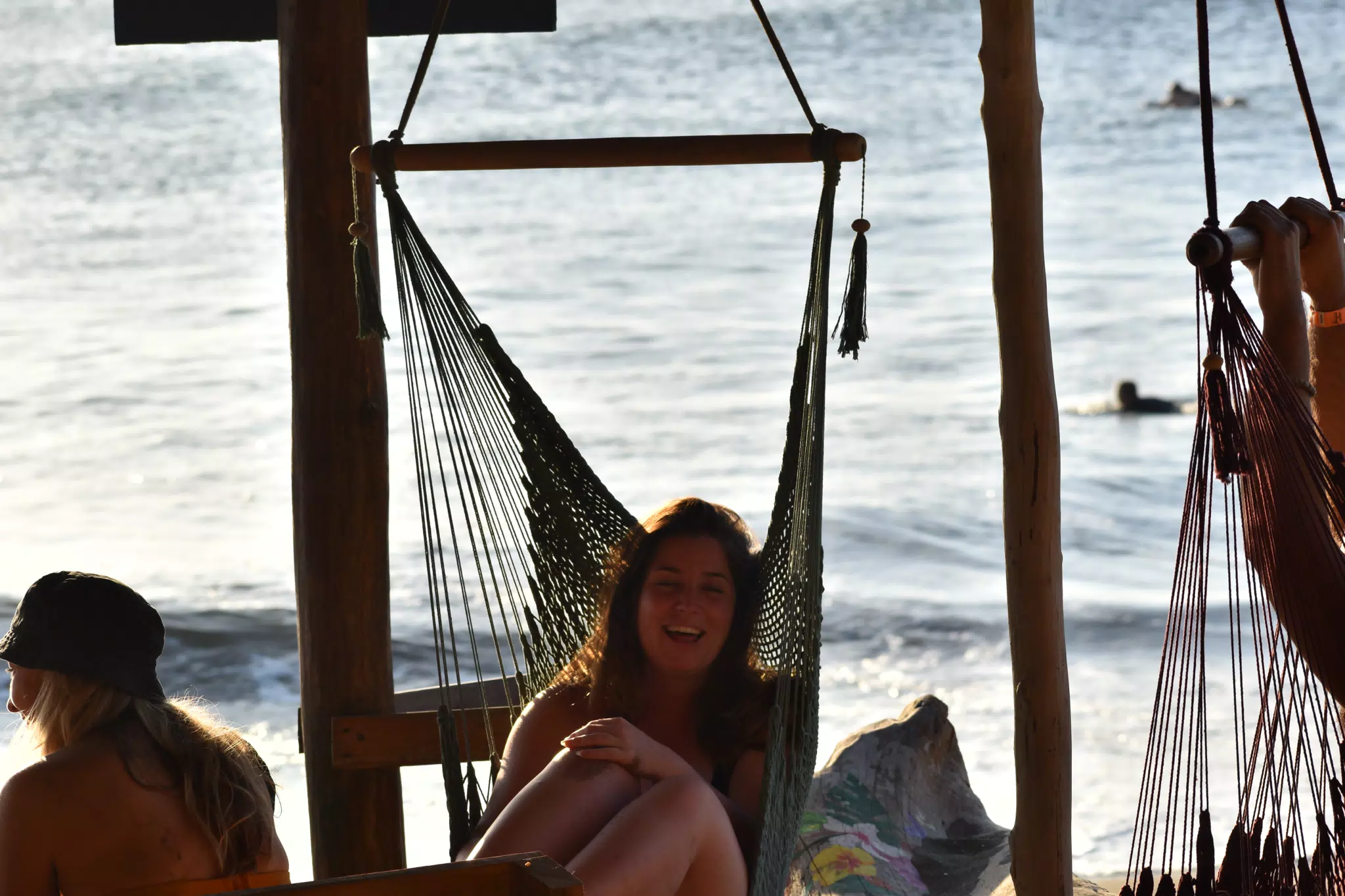 People on the Swings at the Simple Beach Lodge
