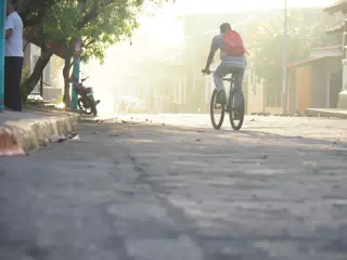 Cyclist on Street, Leon, Nicaragua