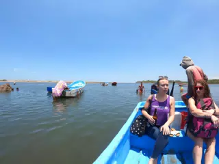 Girls on the Lancha Heading to the Surfing Turtle