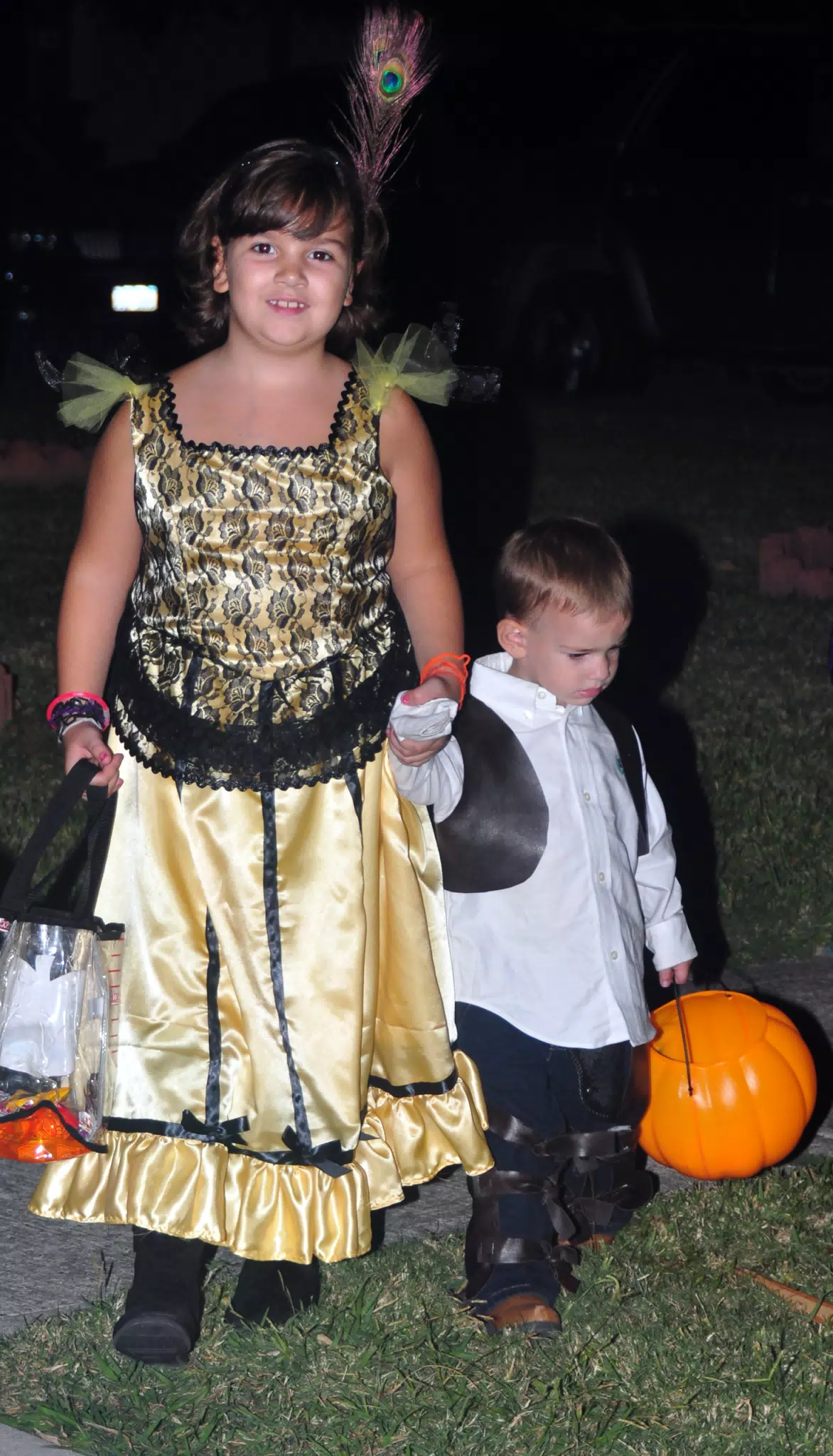 Emily Taking Garrett Trick or Treating