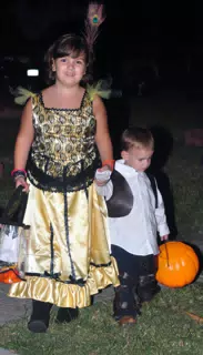 Emily Taking Garrett Trick or Treating