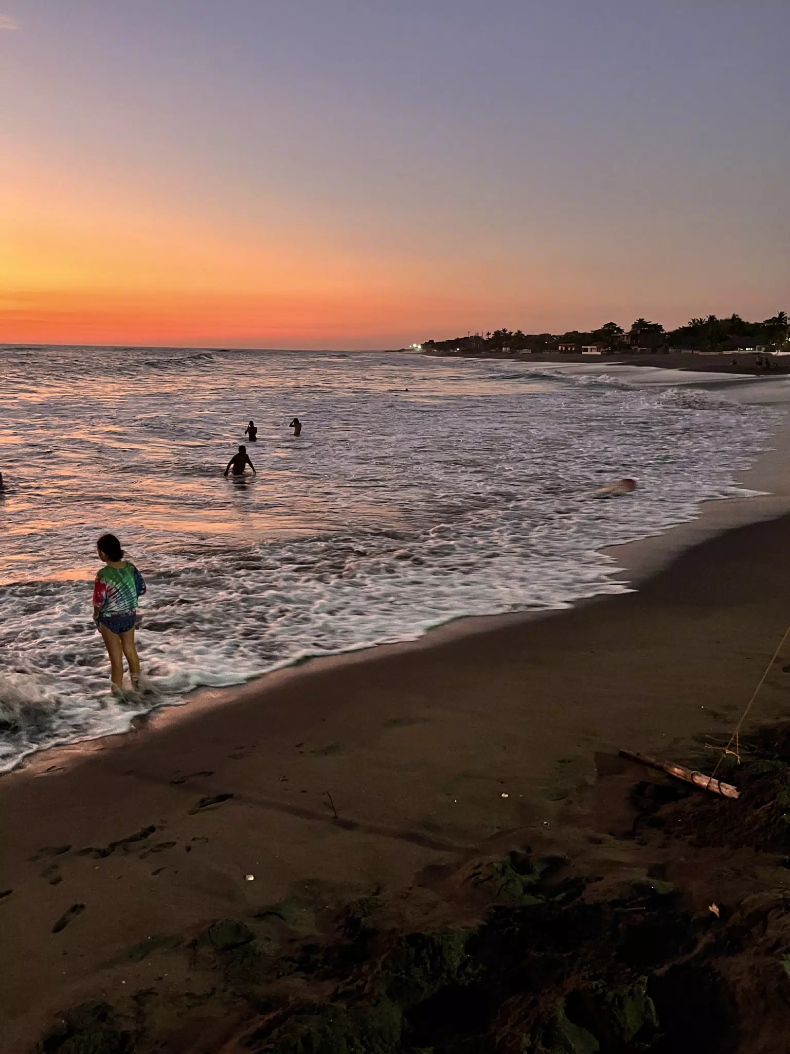 Twilight Swimming in the Paciifc Ocean at the Simple Beach Lodge, Las Peñitas, Nicaragua