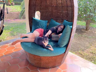 Luciana and Clive on the Egg Chair on the Veranda