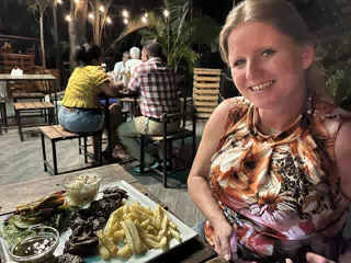 Kim with Churrasco Steak at En el Vivero, Leon, Nicaragua