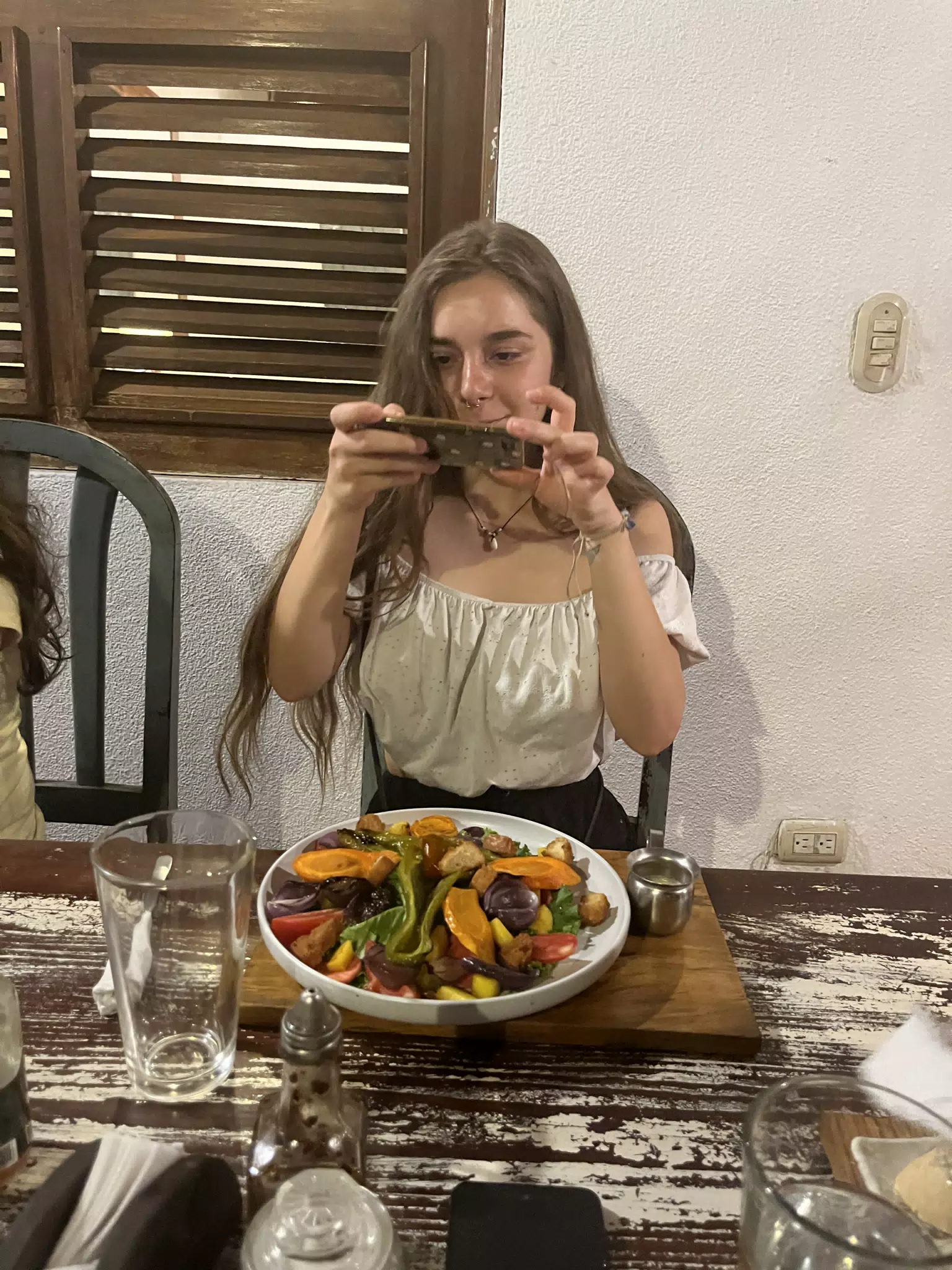 Camille Showing Off Her Meal at Sua Leon Nicaragua