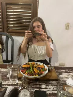 Camille Showing Off Her Meal at Sua Leon Nicaragua