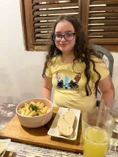 Luciana with Rigatoni Pasta with Garlic & White Wine Sauce & Shrimp at Sua Leon Nicaragua
