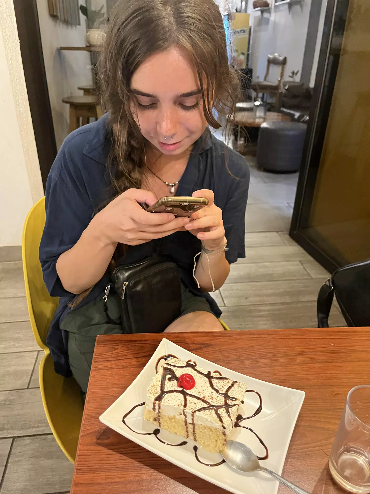 Camille Photographing Tres Leches at Dr Coffee, Sutiava, Leon, Nicaragua
