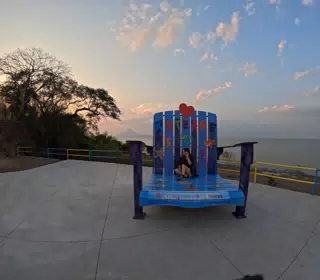 Camille on Giant Chair at Mirador Piedras Azules in Matearea Nicaragua