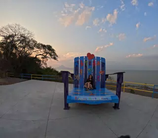 Camille on Giant Chair at Mirador Piedras Azules in Matearea Nicaragua