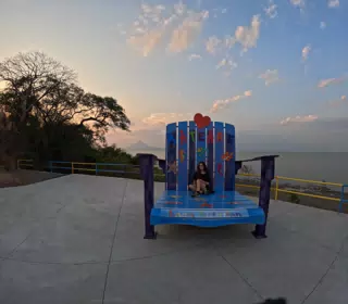 Camille on Giant Chair at Mirador Piedras Azules in Matearea Nicaragua