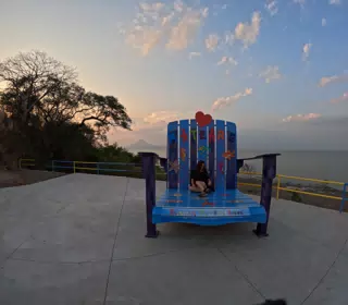 Camille on Giant Chair at Mirador Piedras Azules in Matearea Nicaragua