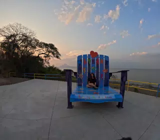 Camille on Giant Chair at Mirador Piedras Azules in Matearea Nicaragua